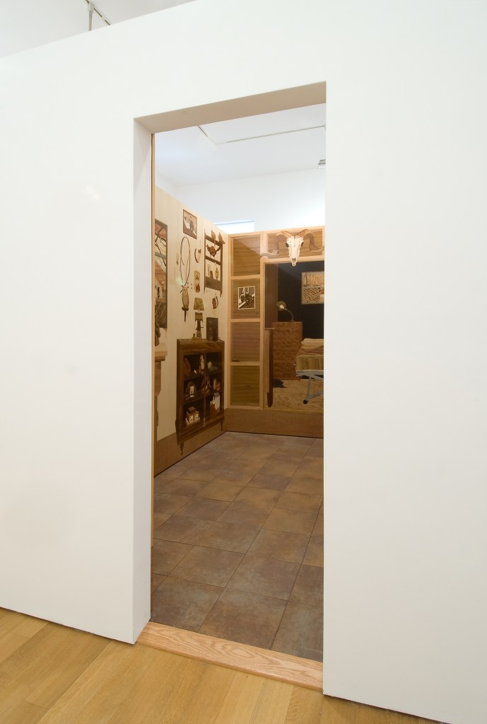 Room (detail, exterior of installation), 2008, marquetry: wood veneer, pyrography and lacquer, 96 x 120 x 96 inches